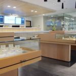 Glass Displays and Flat-Screen Televisions at Harvest of Scottsdale Dispensary - Credit: Harvest
