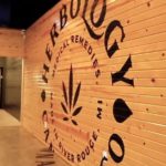 Wall Logo at Herbology's River Rouge Dispensary - Credit: Herbology Cannabis Co.