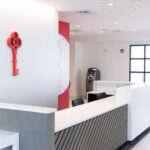 Reception Desk and ATM at Happy Valley's East Boston Dispensary - Photo Credit: Happy Valley